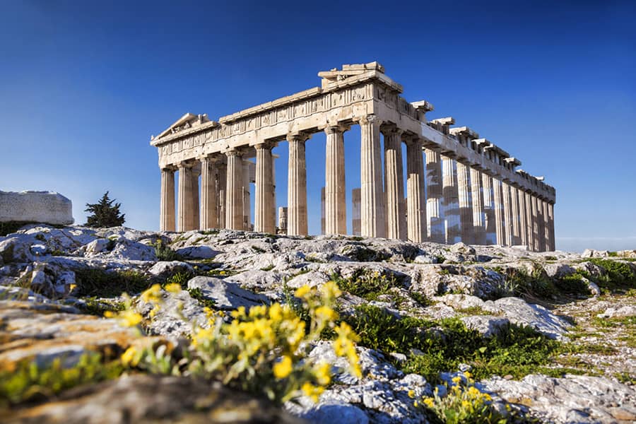 Which ancient Greek city-state was known for its military discipline and warrior society?